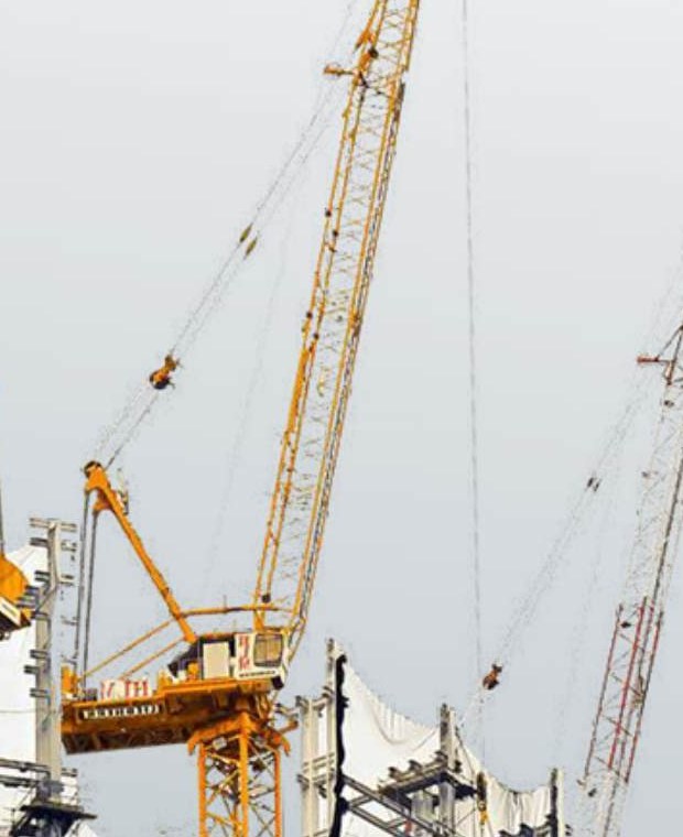 High-rise construction site with tower cranes