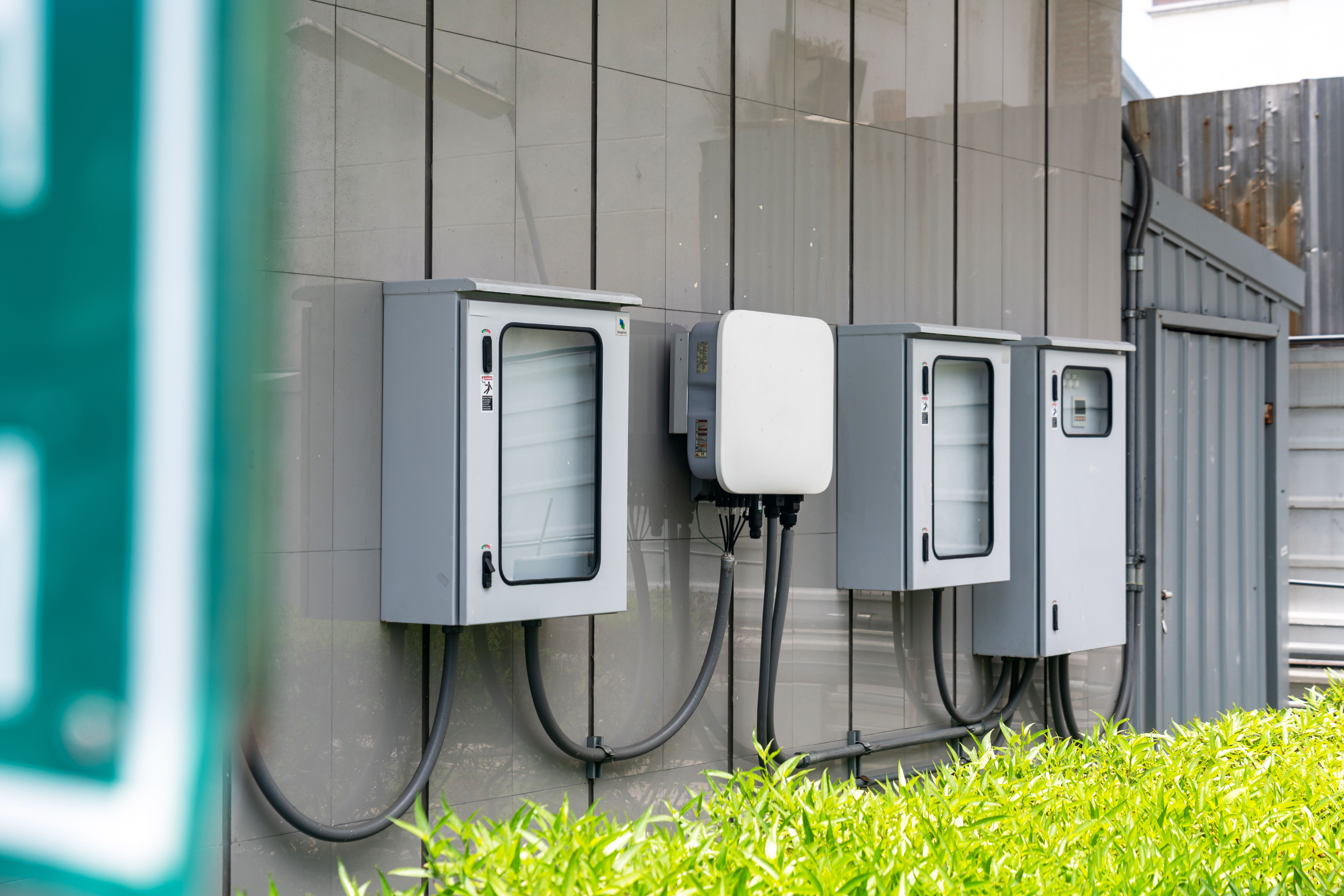 Technicians installing air-cooled chiller MEP equipment